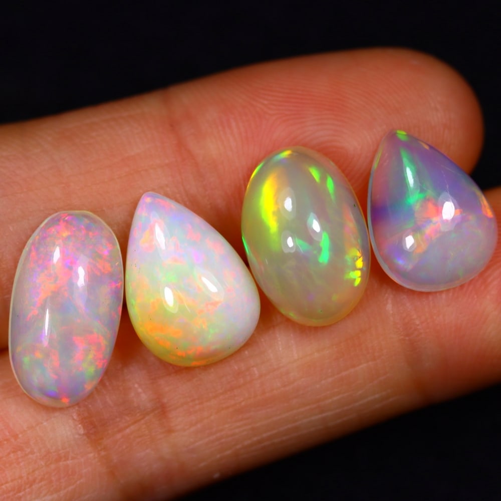 13.54Ct Group of 4 Welo Opal Polished - Ethiopian Opal: Ksmith Jewels Global Welcome to our auction house, today auction brought to you by Ksmith Jewels Global based in Penang, Malaysia specialize in all kinds of opal and color gemstone both in manufacturi
