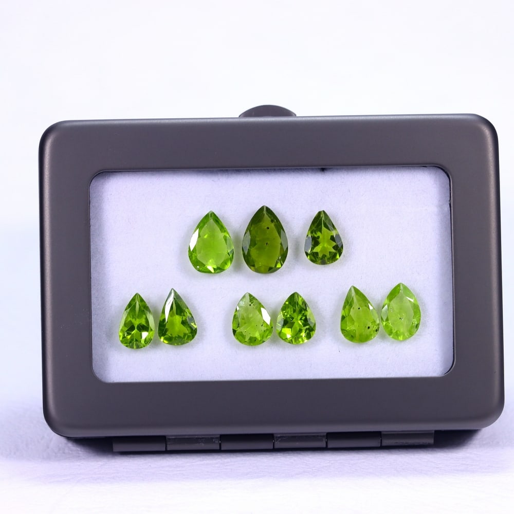 13.78Ct Group of Green Peridot - Polished Faceted: Ksmith Jewels Global Welcome to our auction house, today auction brought to you by Ksmith Jewels Global based in Penang, Malaysia specialize in all kinds of opal and color gemstone both in manufacturi