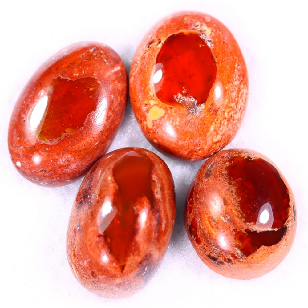 44.12Ct Group of 4 Mexican Fire Opal - Mexican Opal - Cabochon: Ksmith Jewels Global Welcome to our auction house, today auction brought to you by Ksmith Jewels Global based in Penang, Malaysia specialize in all kinds of opal and color gemstone both in manufacturi