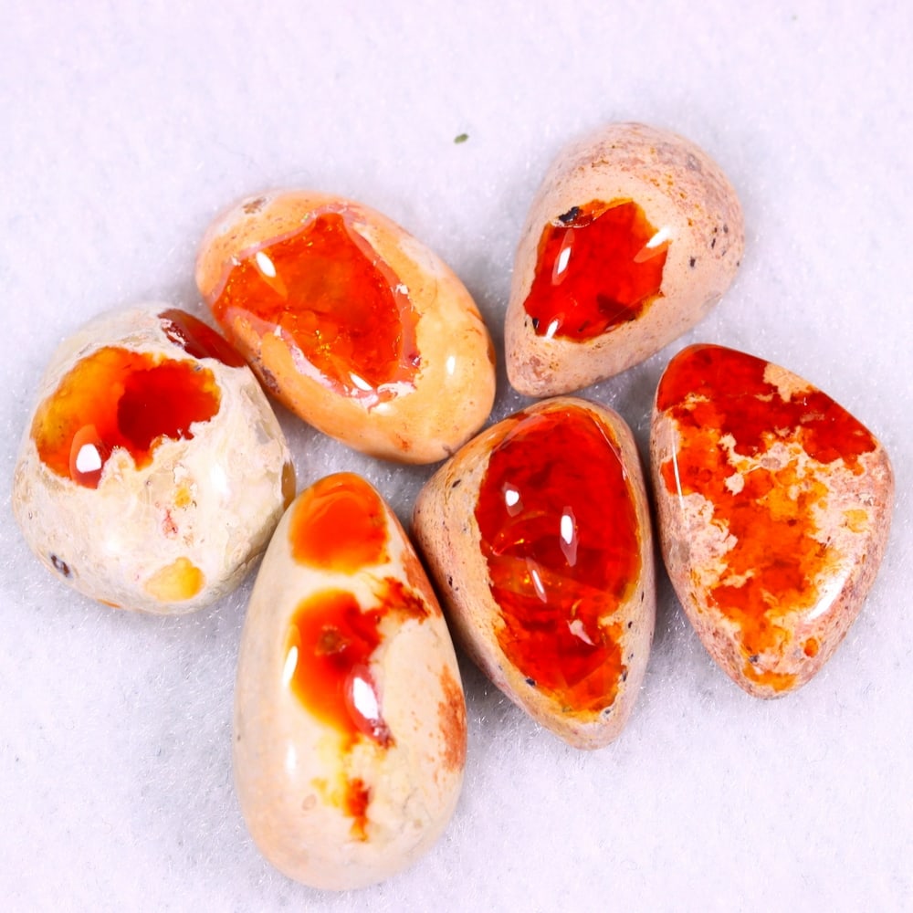 26.31Ct Group of 6 Mexican Fire Opal - Mexican Opal - Cabochon: Ksmith Jewels Global Welcome to our auction house, today auction brought to you by Ksmith Jewels Global based in Penang, Malaysia specialize in all kinds of opal and color gemstone both in manufacturi