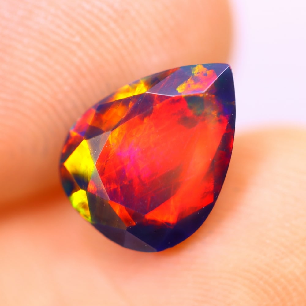 1.57Ct Welo Black Opal Polished - Ethiopian Opal - Pear Faceted: Ksmith Jewels Global Welcome to our auction house, today auction brought to you by Ksmith Jewels Global based in Penang, Malaysia specialize in all kinds of opal and color gemstone both in manufacturi