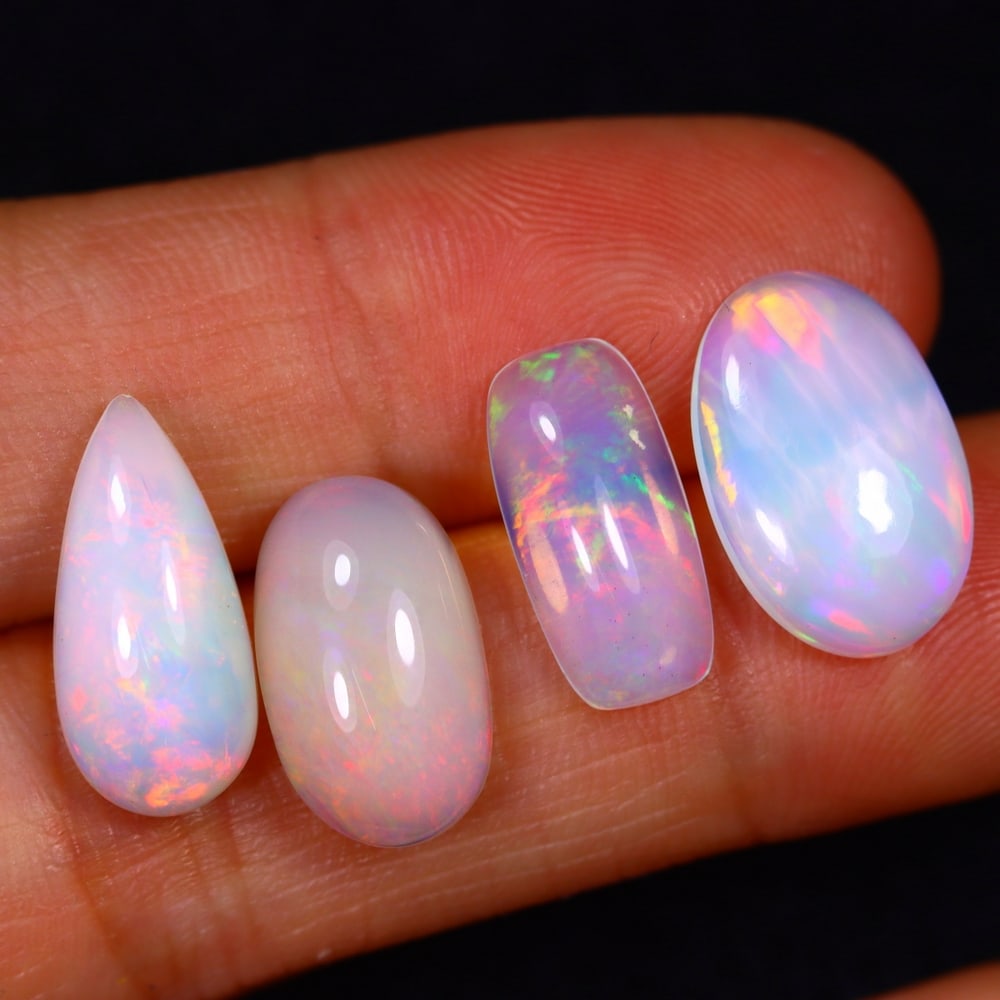 10.58Ct Group of 4 Welo Opal Polished - Ethiopian Opal: Ksmith Jewels Global Welcome to our auction house, today auction brought to you by Ksmith Jewels Global based in Penang, Malaysia specialize in all kinds of opal and color gemstone both in manufacturi