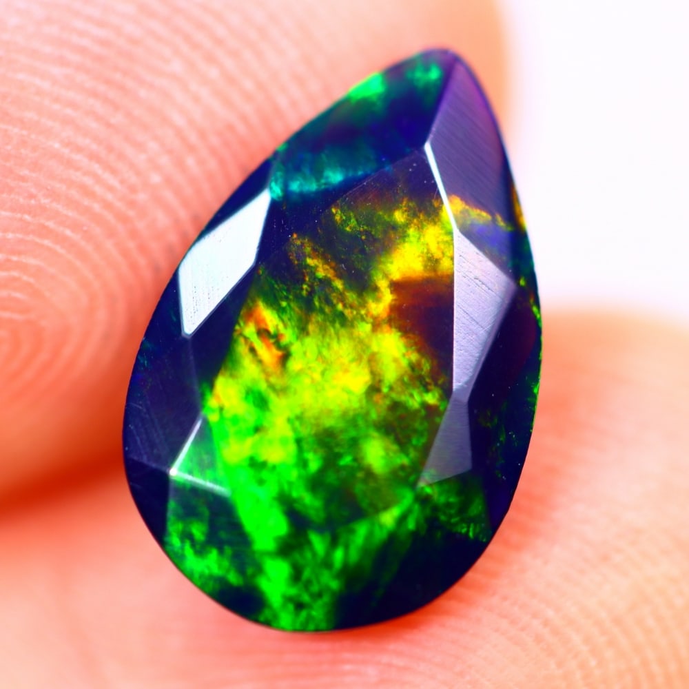 1.60Ct Welo Black Opal Polished - Ethiopian Opal - Pear Faceted: Ksmith Jewels Global Welcome to our auction house, today auction brought to you by Ksmith Jewels Global based in Penang, Malaysia specialize in all kinds of opal and color gemstone both in manufacturi