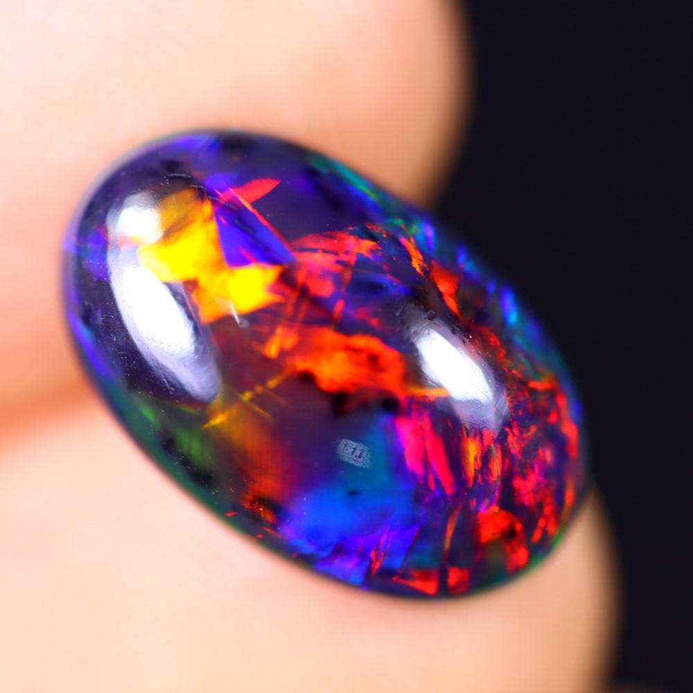 3.42Ct Welo Black Opal Polished - Ethiopian Opal - Oval Cabochon: Ksmith Jewels Global Welcome to our auction house, today auction brought to you by Ksmith Jewels Global based in Penang, Malaysia specialize in all kinds of opal and color gemstone both in manufacturi