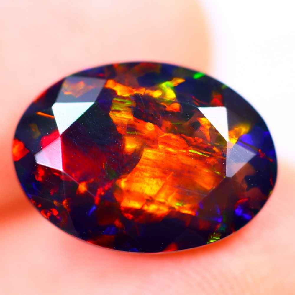 2.38Ct Welo Black Opal Polished - Ethiopian Opal - Oval Faceted: Ksmith Jewels Global Welcome to our auction house, today auction brought to you by Ksmith Jewels Global based in Penang, Malaysia specialize in all kinds of opal and color gemstone both in manufacturi