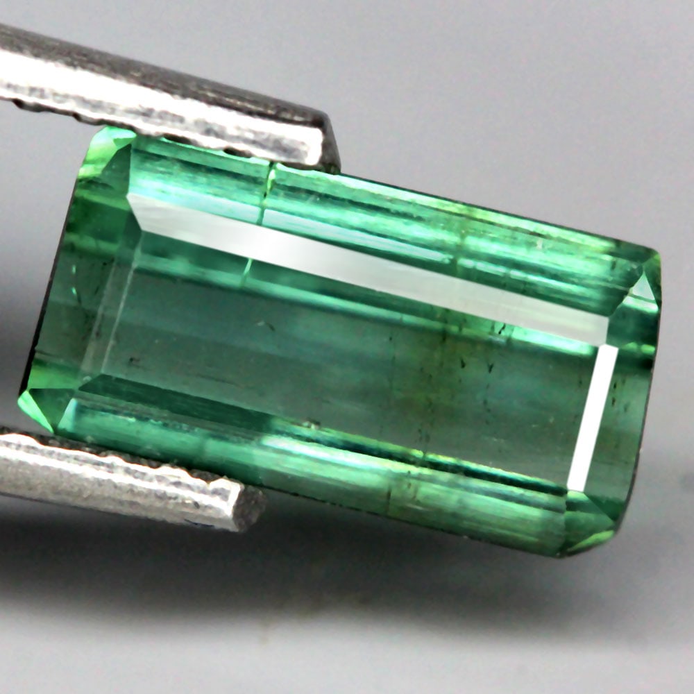 Tourmaline 0.91Ct Emerald Cut Natural Mozambique Green Tourmaline OT6673: Ksmith Jewels Global Welcome to our auction house, today auction brought to you by Ksmith Jewels Global based in Penang, Malaysia specialize in all kinds of opal and color gemstone both in manufacturi
