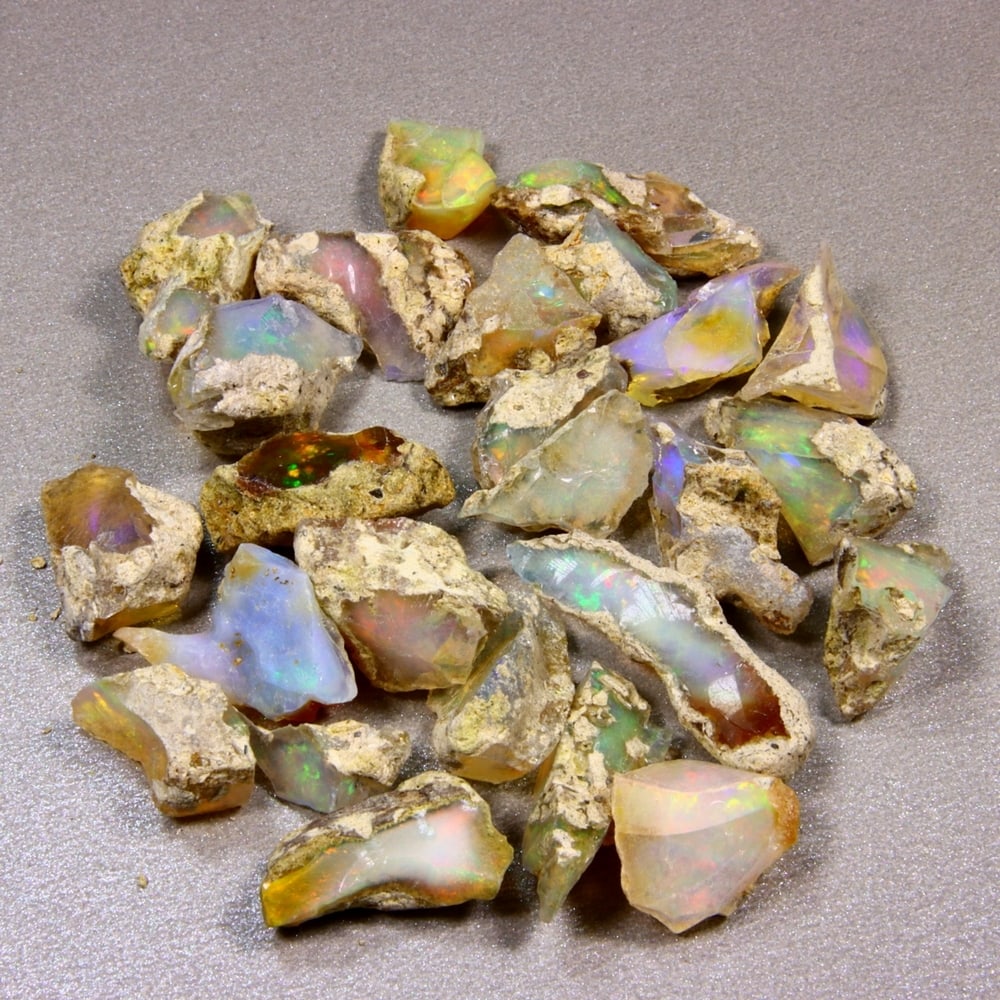 100Ct Rough Opal Specimen - Ethiopian Opal - Mineral Rough Set: Ksmith Jewels Global Welcome to our auction house, today auction brought to you by Ksmith Jewels Global based in Penang, Malaysia specialize in all kinds of opal and color gemstone both in manufacturi
