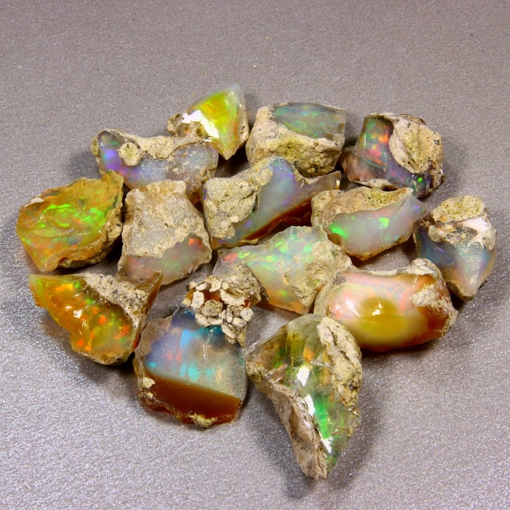 103Ct Rough Opal Specimen - Ethiopian Opal - Mineral Rough Set: Ksmith Jewels Global Welcome to our auction house, today auction brought to you by Ksmith Jewels Global based in Penang, Malaysia specialize in all kinds of opal and color gemstone both in manufacturi