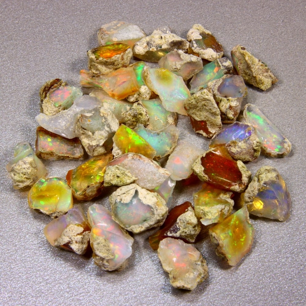80Ct Rough Opal Specimen - Ethiopian Opal - Mineral Rough Set: Ksmith Jewels Global Welcome to our auction house, today auction brought to you by Ksmith Jewels Global based in Penang, Malaysia specialize in all kinds of opal and color gemstone both in manufacturi