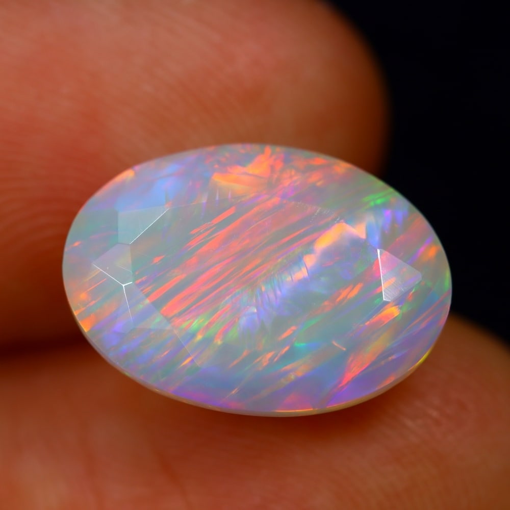 4.78Ct Welo Opal Polished - Ethiopian Opal - Oval Faceted: Ksmith Jewels Global Welcome to our auction house, today auction brought to you by Ksmith Jewels Global based in Penang, Malaysia specialize in all kinds of opal and color gemstone both in manufacturi