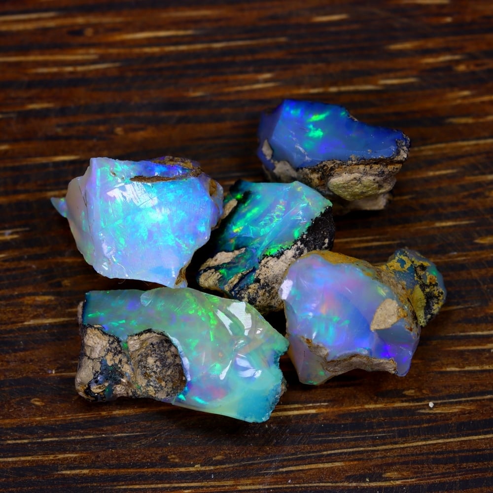 32Ct Group of 5 Rough Opal Specimen - Ethiopian Opal - Mineral Rough Set: Ksmith Jewels Global Welcome to our auction house, today auction brought to you by Ksmith Jewels Global based in Penang, Malaysia specialize in all kinds of opal and color gemstone both in manufacturi