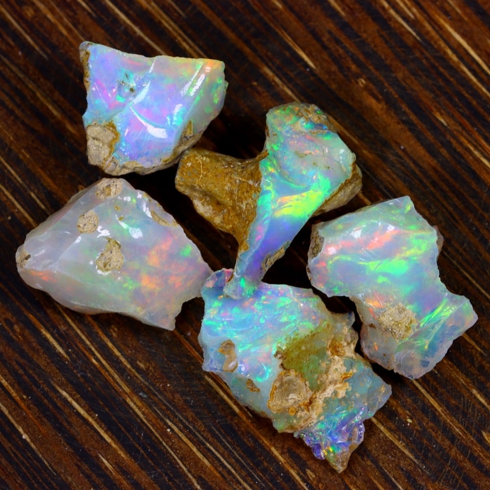 33Ct Group of 5 Rough Opal Specimen - Ethiopian Opal - Mineral Rough Set: Ksmith Jewels Global Welcome to our auction house, today auction brought to you by Ksmith Jewels Global based in Penang, Malaysia specialize in all kinds of opal and color gemstone both in manufacturi