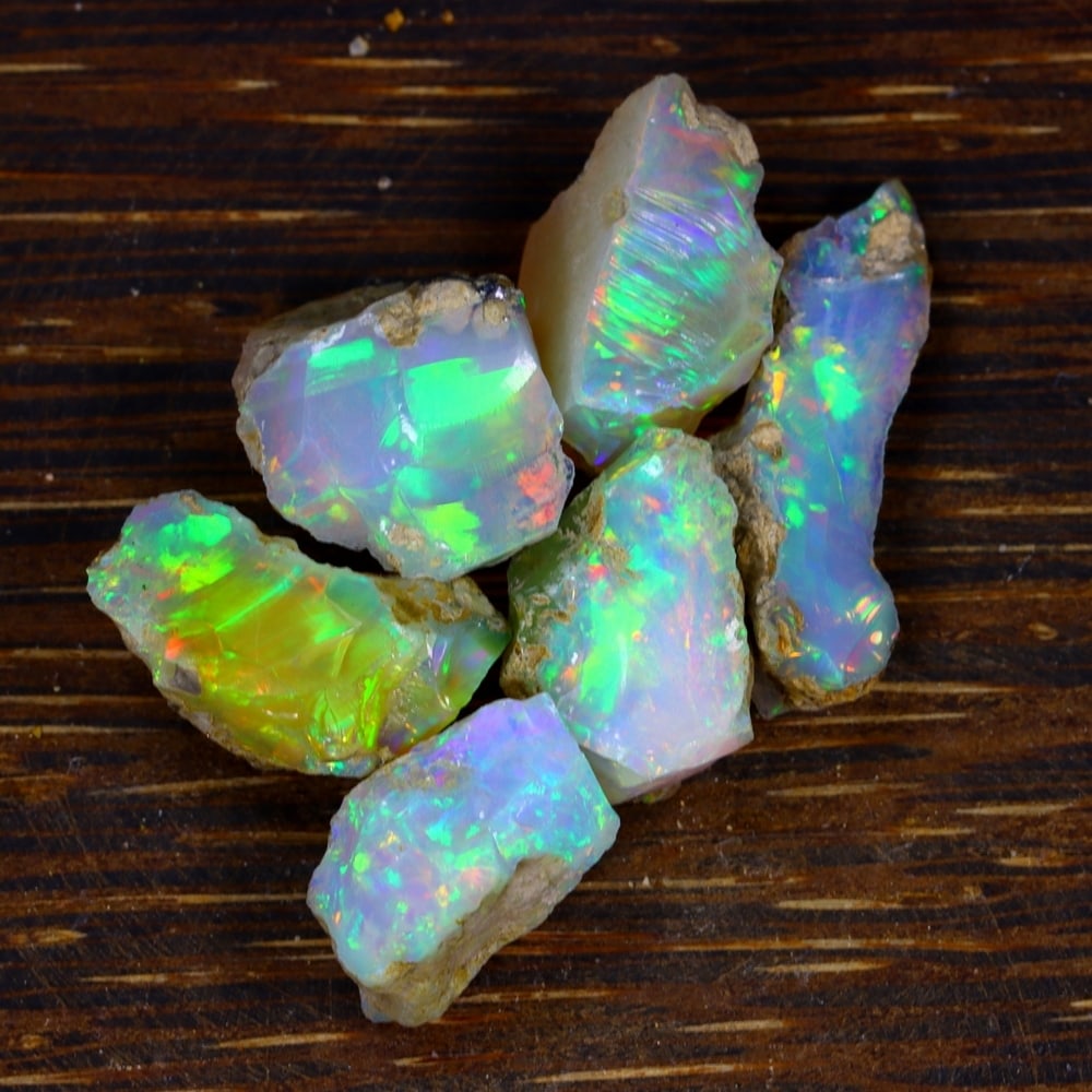 39Ct Group of 6 Rough Opal Specimen - Ethiopian Opal - Mineral Rough Set: Ksmith Jewels Global Welcome to our auction house, today auction brought to you by Ksmith Jewels Global based in Penang, Malaysia specialize in all kinds of opal and color gemstone both in manufacturi