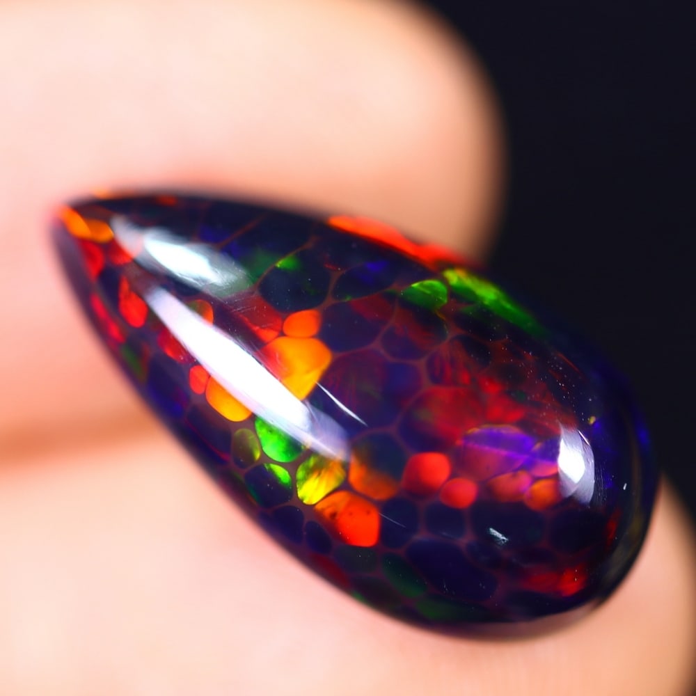 6.34Ct Welo Black Opal Polished - Ethiopian Opal - Pear Cabochon: Ksmith Jewels Global Welcome to our auction house, today auction brought to you by Ksmith Jewels Global based in Penang, Malaysia specialize in all kinds of opal and color gemstone both in manufacturi