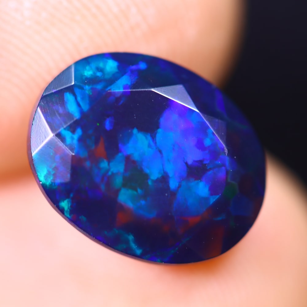 2.43Ct Welo Black Opal Polished - Ethiopian Opal - Oval Faceted: Ksmith Jewels Global Welcome to our auction house, today auction brought to you by Ksmith Jewels Global based in Penang, Malaysia specialize in all kinds of opal and color gemstone both in manufacturi