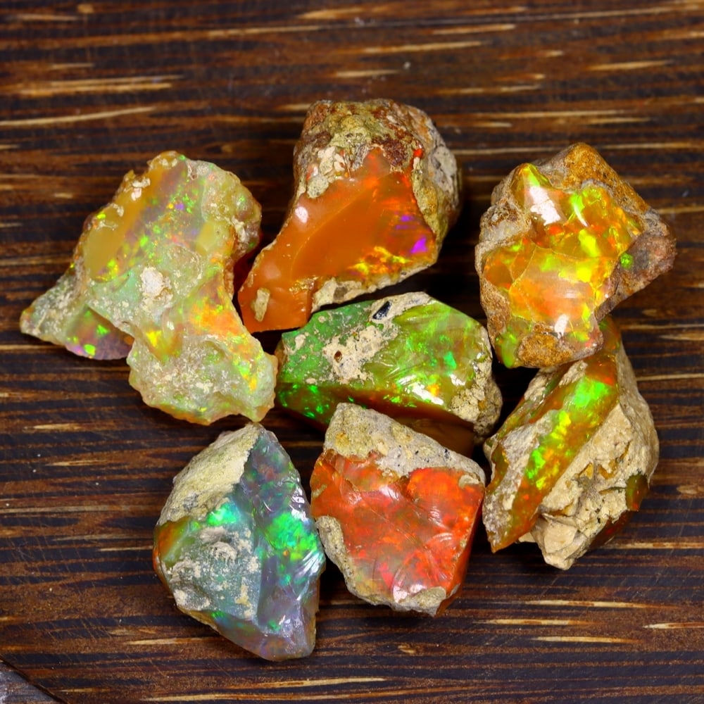 59Ct Group of 7 Rough Opal Specimen - Ethiopian Opal - Mineral Rough Set: Ksmith Jewels Global Welcome to our auction house, today auction brought to you by Ksmith Jewels Global based in Penang, Malaysia specialize in all kinds of opal and color gemstone both in manufacturi