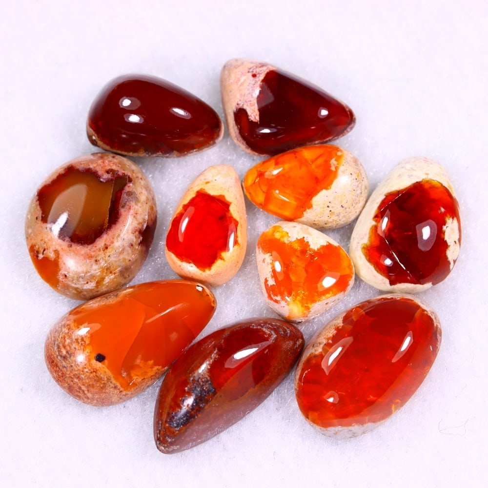 19.09Ct Group of 10 Mexican Fire Opal - Mexican Opal - Cabochon: Ksmith Jewels Global Welcome to our auction house, today auction brought to you by Ksmith Jewels Global based in Penang, Malaysia specialize in all kinds of opal and color gemstone both in manufacturi