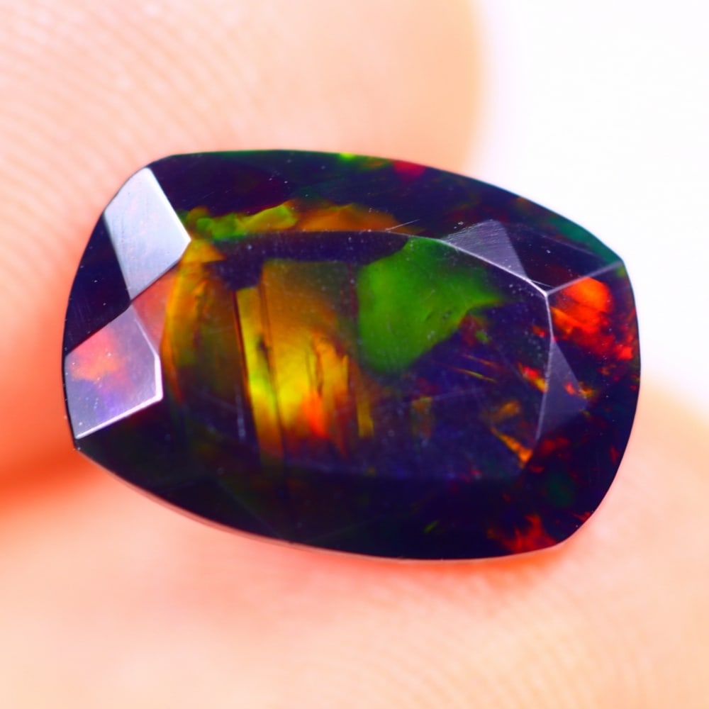 1.89Ct Welo Black Opal Polished - Ethiopian Opal - Rectangle Faceted: Ksmith Jewels Global Welcome to our auction house, today auction brought to you by Ksmith Jewels Global based in Penang, Malaysia specialize in all kinds of opal and color gemstone both in manufacturi