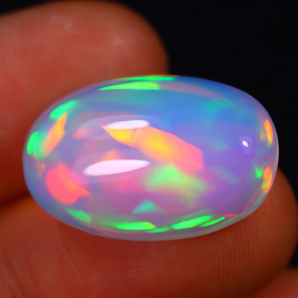 9.11Ct Welo Opal Polished - Ethiopian Opal - Oval Cabochon: Ksmith Jewels Global Welcome to our auction house, today auction brought to you by Ksmith Jewels Global based in Penang, Malaysia specialize in all kinds of opal and color gemstone both in manufacturi