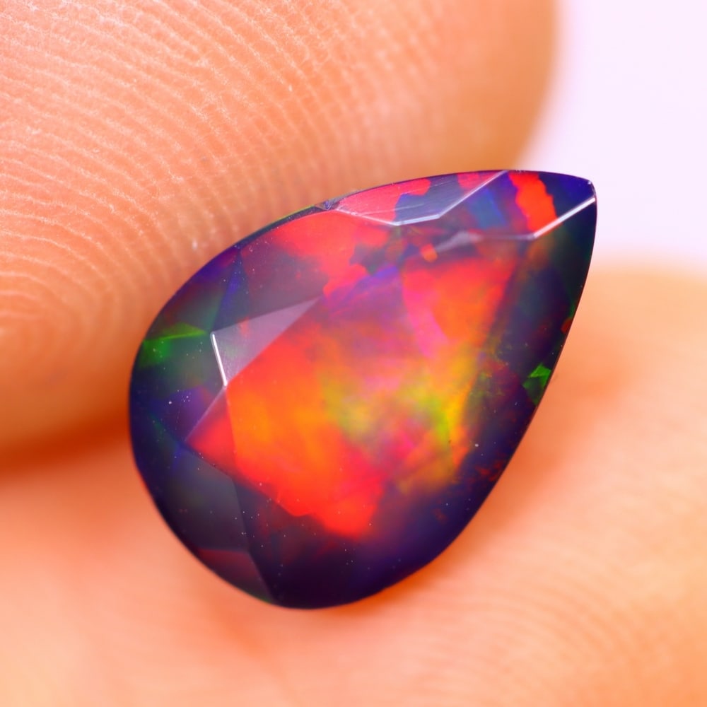 1.53Ct Welo Black Opal Polished - Ethiopian Opal - Pear Faceted: Ksmith Jewels Global Welcome to our auction house, today auction brought to you by Ksmith Jewels Global based in Penang, Malaysia specialize in all kinds of opal and color gemstone both in manufacturi