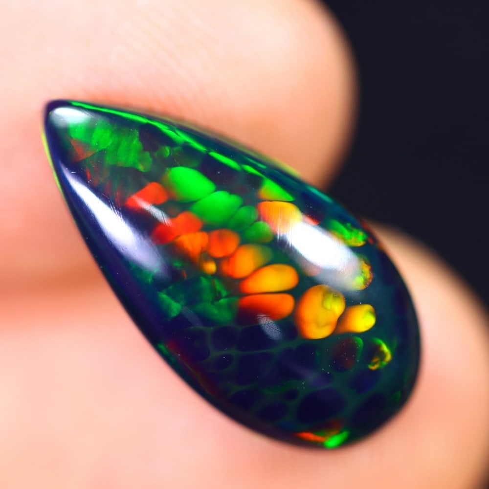 3.48Ct Welo Black Opal Polished - Ethiopian Opal - Pear Cabochon: Ksmith Jewels Global Welcome to our auction house, today auction brought to you by Ksmith Jewels Global based in Penang, Malaysia specialize in all kinds of opal and color gemstone both in manufacturi