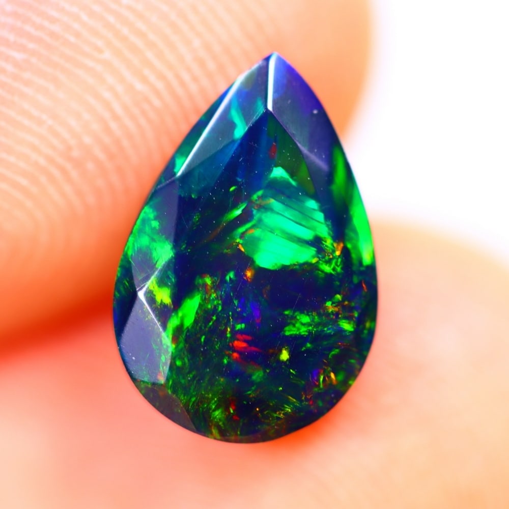 1.51Ct Welo Black Opal Polished - Ethiopian Opal - Pear Faceted: Ksmith Jewels Global Welcome to our auction house, today auction brought to you by Ksmith Jewels Global based in Penang, Malaysia specialize in all kinds of opal and color gemstone both in manufacturi