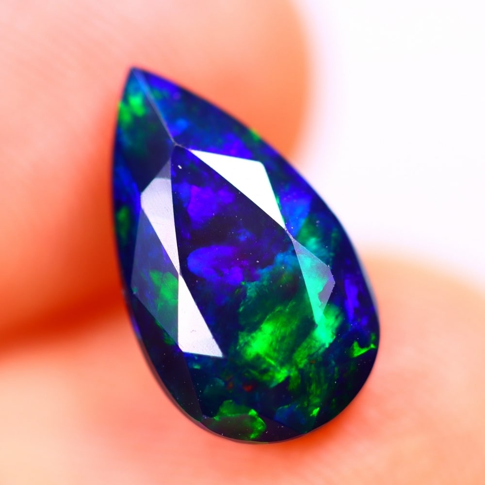 1.67Ct Welo Black Opal Polished - Ethiopian Opal - Pear Faceted: Ksmith Jewels Global Welcome to our auction house, today auction brought to you by Ksmith Jewels Global based in Penang, Malaysia specialize in all kinds of opal and color gemstone both in manufacturi