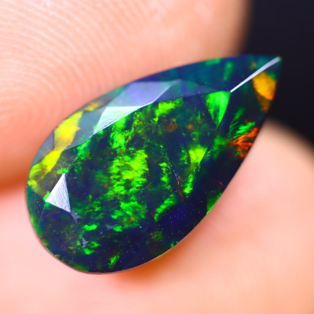2.64Ct Welo Black Opal Polished - Ethiopian Opal - Pear Faceted: Ksmith Jewels Global Welcome to our auction house, today auction brought to you by Ksmith Jewels Global based in Penang, Malaysia specialize in all kinds of opal and color gemstone both in manufacturi