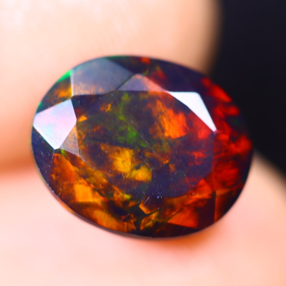 2.70Ct Welo Black Opal Polished - Ethiopian Opal - Oval Faceted: Ksmith Jewels Global Welcome to our auction house, today auction brought to you by Ksmith Jewels Global based in Penang, Malaysia specialize in all kinds of opal and color gemstone both in manufacturi
