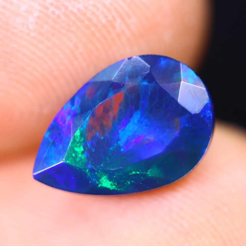 1.60Ct Welo Black Opal Polished - Ethiopian Opal - Pear Faceted: Ksmith Jewels Global Welcome to our auction house, today auction brought to you by Ksmith Jewels Global based in Penang, Malaysia specialize in all kinds of opal and color gemstone both in manufacturi