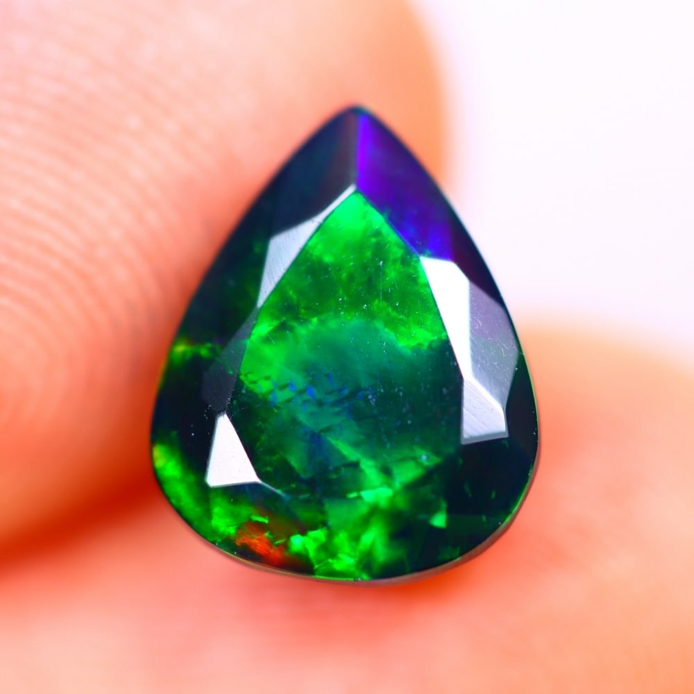 1.63Ct Welo Black Opal Polished - Ethiopian Opal - Pear Faceted: Ksmith Jewels Global Welcome to our auction house, today auction brought to you by Ksmith Jewels Global based in Penang, Malaysia specialize in all kinds of opal and color gemstone both in manufacturi