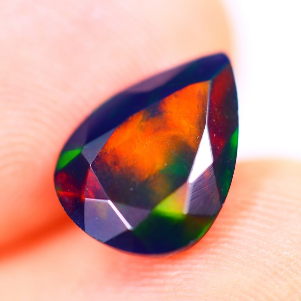 1.52Ct Welo Black Opal Polished - Ethiopian Opal - Pear Faceted: Ksmith Jewels Global Welcome to our auction house, today auction brought to you by Ksmith Jewels Global based in Penang, Malaysia specialize in all kinds of opal and color gemstone both in manufacturi