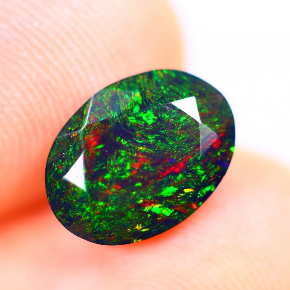1.27Ct Welo Black Opal Polished - Ethiopian Opal - Pear Faceted: Ksmith Jewels Global Welcome to our auction house, today auction brought to you by Ksmith Jewels Global based in Penang, Malaysia specialize in all kinds of opal and color gemstone both in manufacturi
