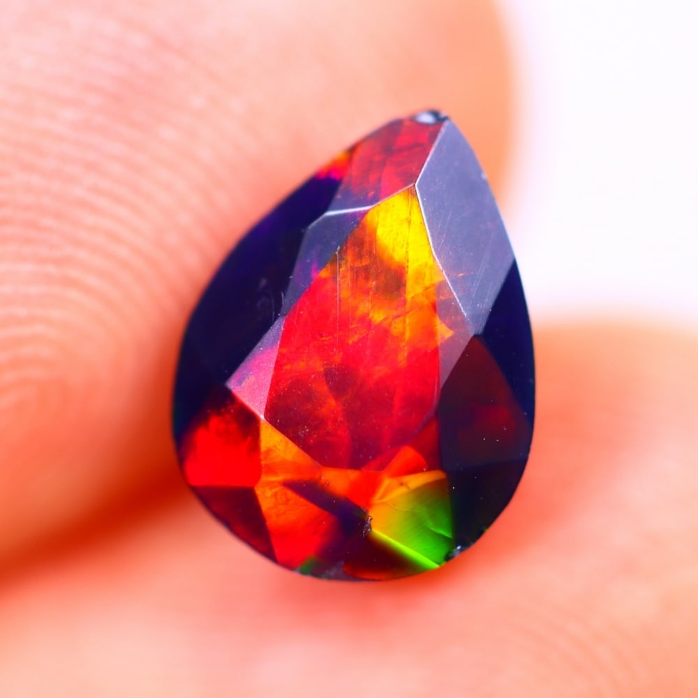 1.32Ct Welo Black Opal Polished - Ethiopian Opal - Oval Faceted: Ksmith Jewels Global Welcome to our auction house, today auction brought to you by Ksmith Jewels Global based in Penang, Malaysia specialize in all kinds of opal and color gemstone both in manufacturi