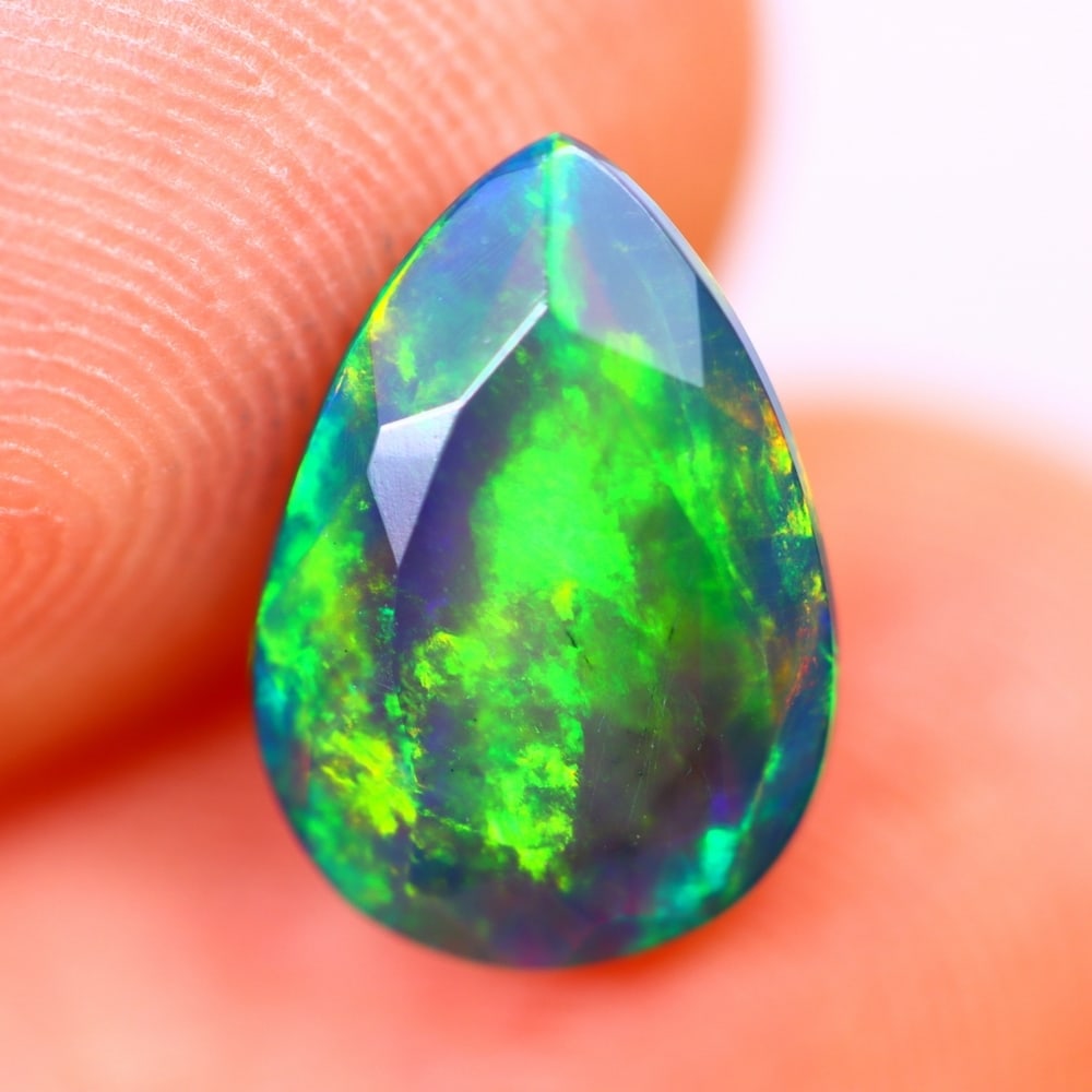 1.61Ct Welo Black Opal Polished - Ethiopian Opal - Pear Faceted: Ksmith Jewels Global Welcome to our auction house, today auction brought to you by Ksmith Jewels Global based in Penang, Malaysia specialize in all kinds of opal and color gemstone both in manufacturi