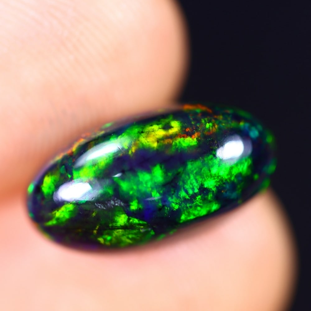2.55Ct Welo Black Opal Polished - Ethiopian Opal - Oval Cabochon (1 of 7)