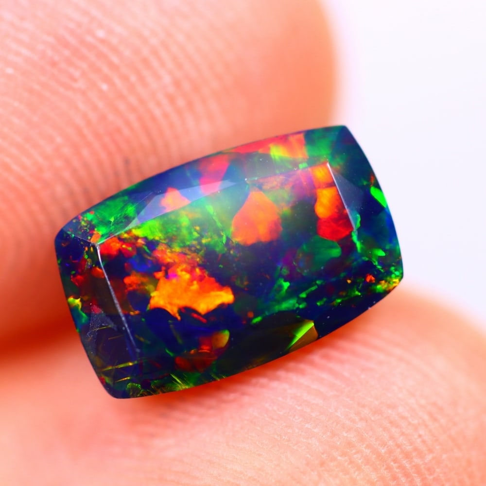1.32Ct Welo Black Opal Polished - Ethiopian Opal - Rectangle Faceted: Ksmith Jewels Global Welcome to our auction house, today auction brought to you by Ksmith Jewels Global based in Penang, Malaysia specialize in all kinds of opal and color gemstone both in manufacturi