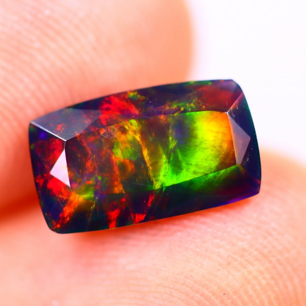 1.16Ct Welo Black Opal Polished - Ethiopian Opal - Rectangle Faceted: Ksmith Jewels Global Welcome to our auction house, today auction brought to you by Ksmith Jewels Global based in Penang, Malaysia specialize in all kinds of opal and color gemstone both in manufacturi
