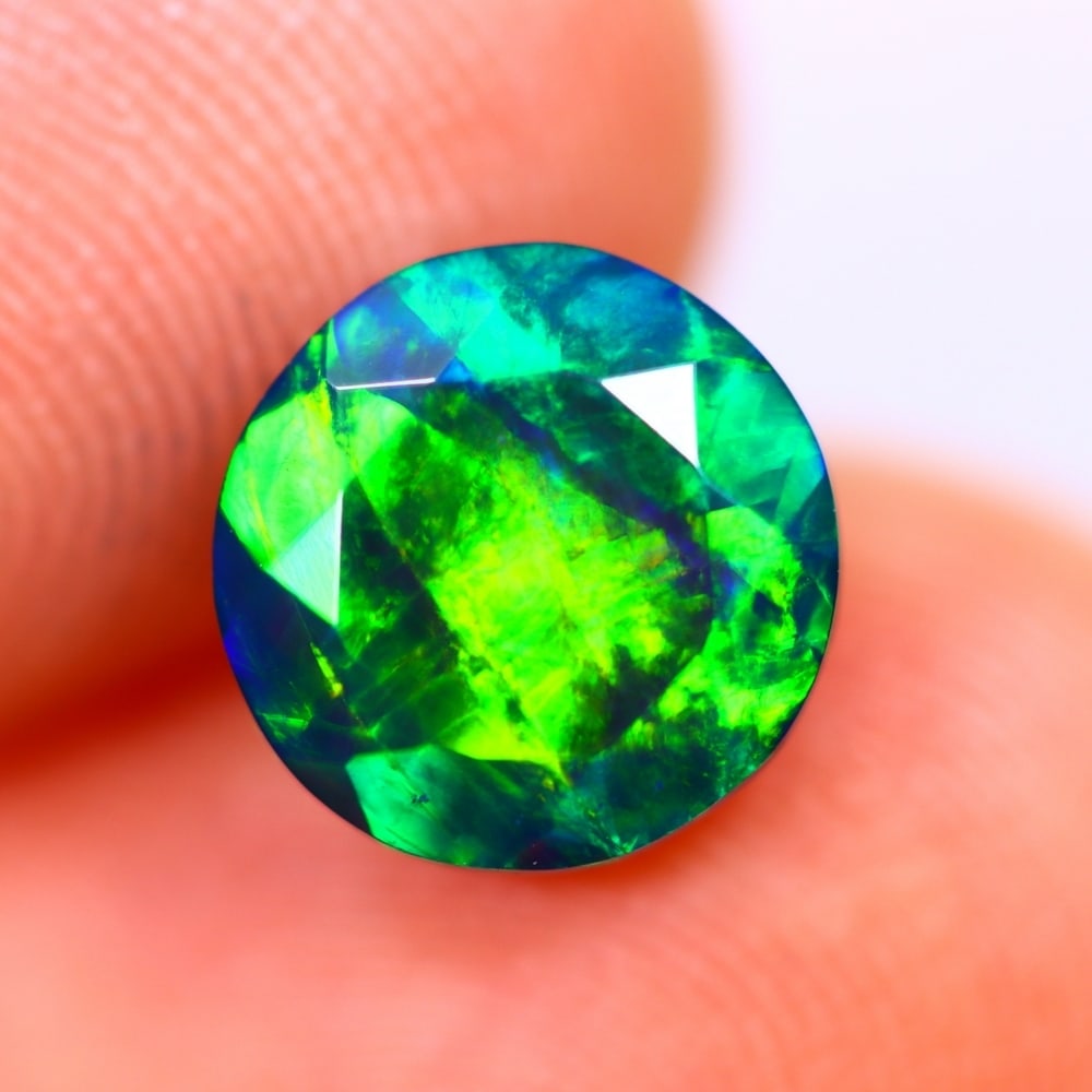 1.33Ct Welo Black Opal Polished - Ethiopian Opal - Round Faceted: Ksmith Jewels Global Welcome to our auction house, today auction brought to you by Ksmith Jewels Global based in Penang, Malaysia specialize in all kinds of opal and color gemstone both in manufacturi