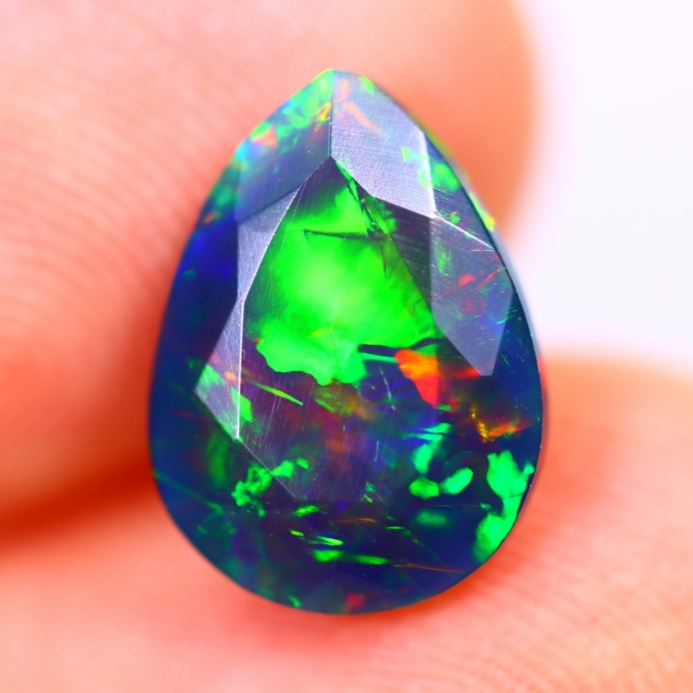 1.70Ct Welo Black Opal Polished - Ethiopian Opal - Pear Faceted: Ksmith Jewels Global Welcome to our auction house, today auction brought to you by Ksmith Jewels Global based in Penang, Malaysia specialize in all kinds of opal and color gemstone both in manufacturi