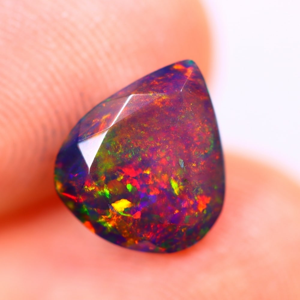 1.27Ct Welo Black Opal Polished - Ethiopian Opal - Pear Faceted: Ksmith Jewels Global Welcome to our auction house, today auction brought to you by Ksmith Jewels Global based in Penang, Malaysia specialize in all kinds of opal and color gemstone both in manufacturi