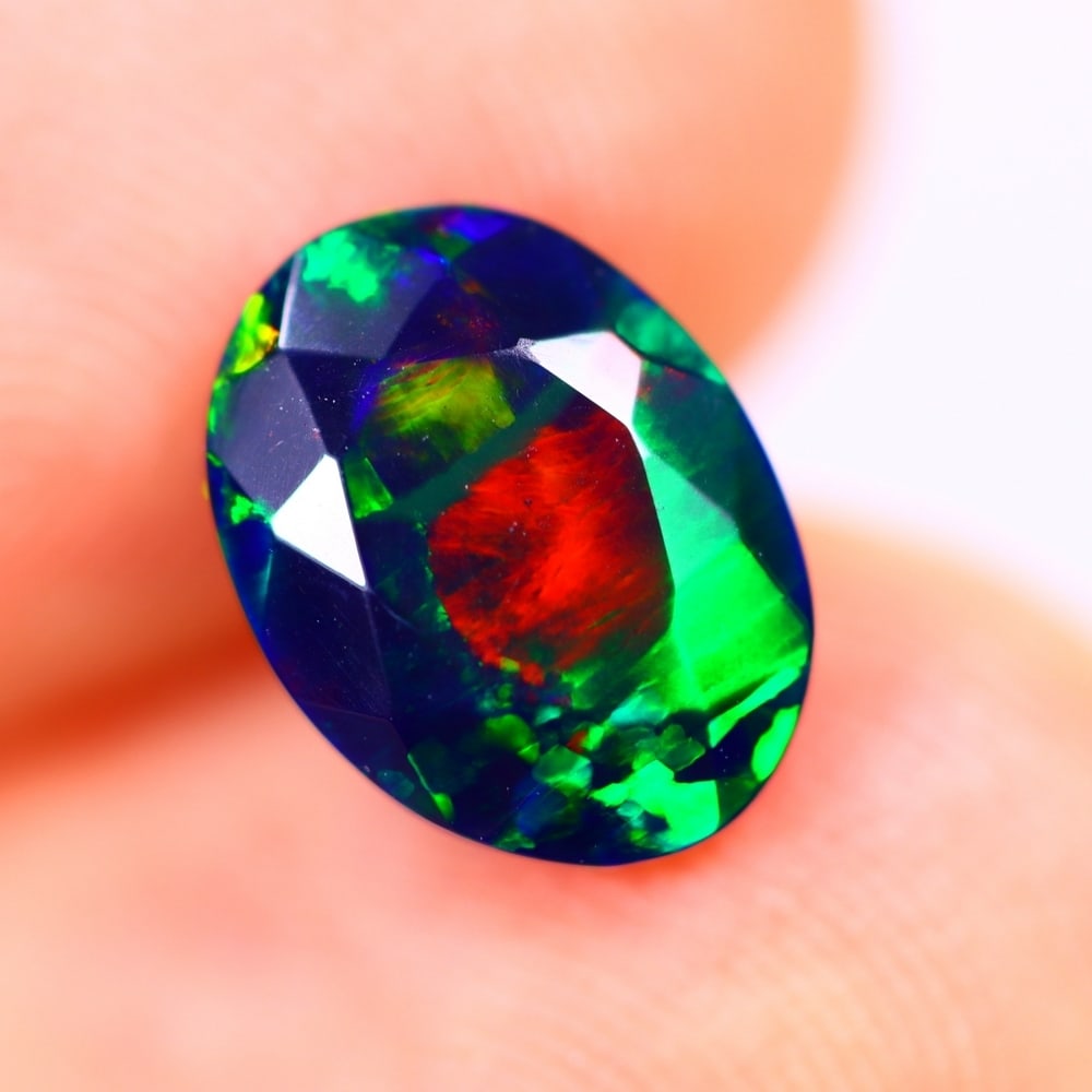 1.13Ct Welo Black Opal Polished - Ethiopian Opal - Oval Faceted: Ksmith Jewels Global Welcome to our auction house, today auction brought to you by Ksmith Jewels Global based in Penang, Malaysia specialize in all kinds of opal and color gemstone both in manufacturi