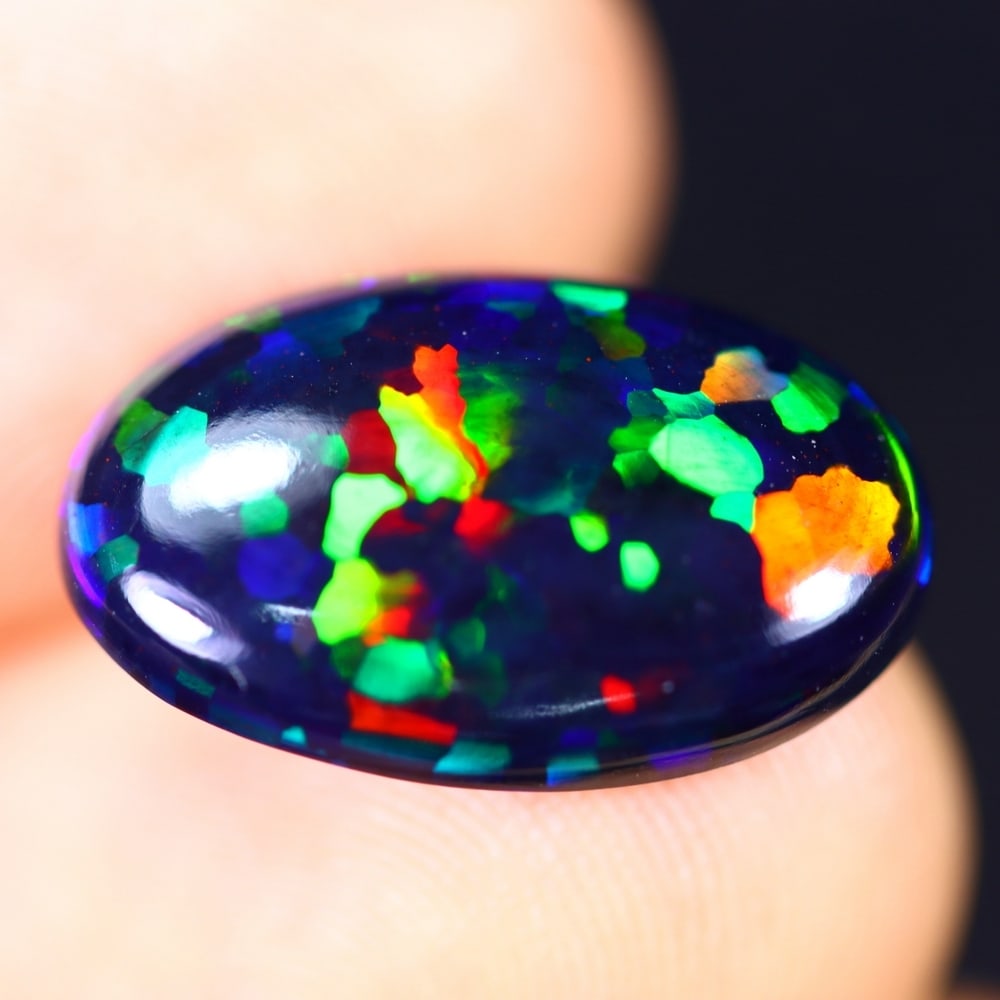 3.88Ct Welo Black Opal Polished - Ethiopian Opal - Oval Cabochon: Ksmith Jewels Global Welcome to our auction house, today auction brought to you by Ksmith Jewels Global based in Penang, Malaysia specialize in all kinds of opal and color gemstone both in manufacturi