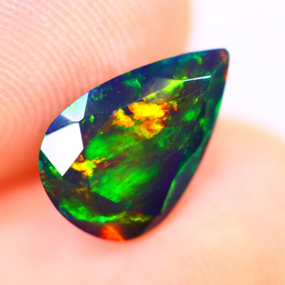 1.71Ct Welo Black Opal Polished - Ethiopian Opal - Pear Faceted: Ksmith Jewels Global Welcome to our auction house, today auction brought to you by Ksmith Jewels Global based in Penang, Malaysia specialize in all kinds of opal and color gemstone both in manufacturi