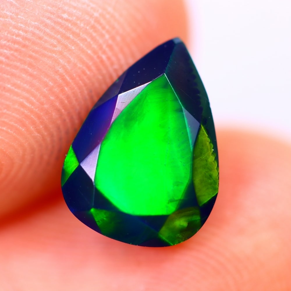 1.57Ct Welo Black Opal Polished - Ethiopian Opal - Pear Faceted: Ksmith Jewels Global Welcome to our auction house, today auction brought to you by Ksmith Jewels Global based in Penang, Malaysia specialize in all kinds of opal and color gemstone both in manufacturi
