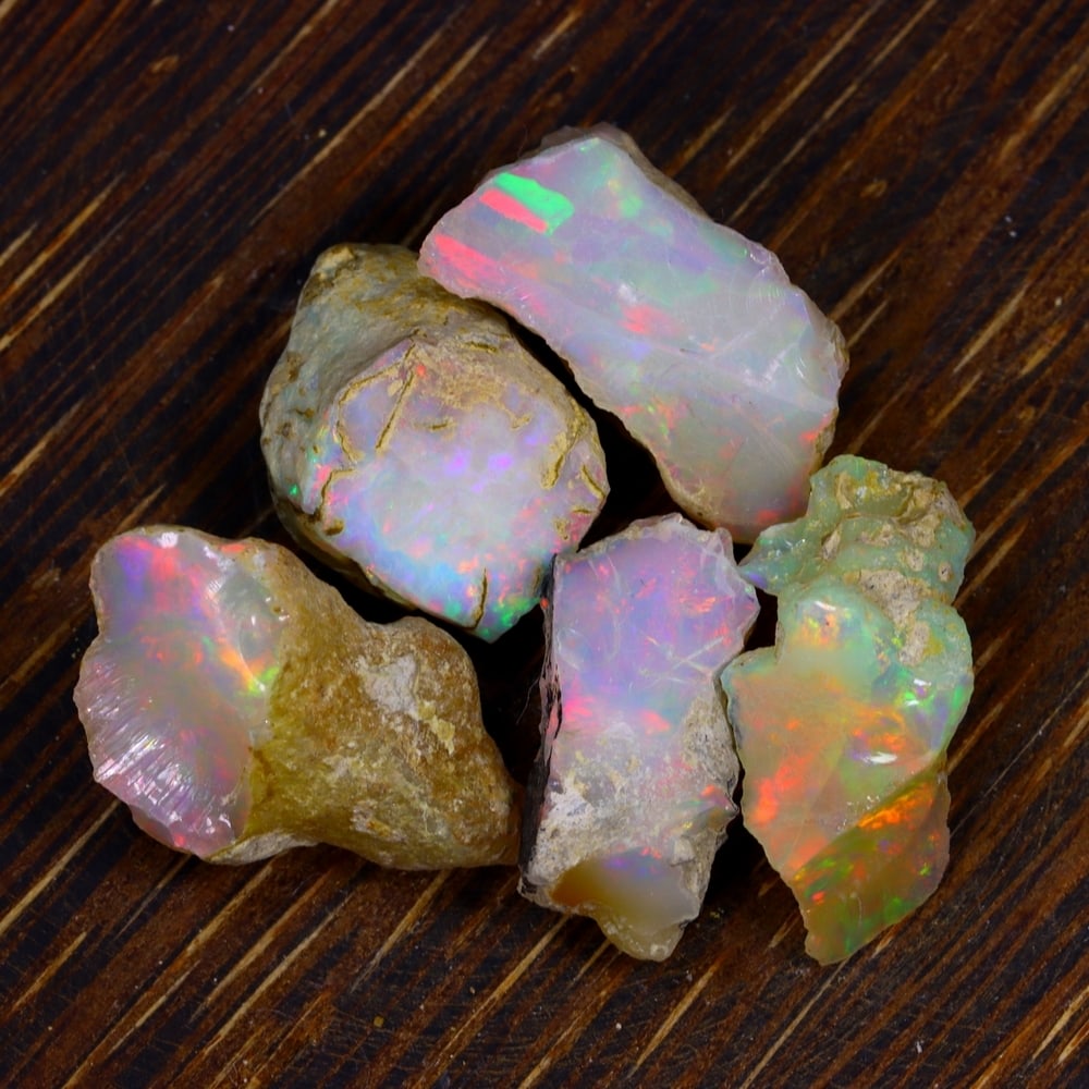 36Ct Group of 5 Rough Opal Specimen - Ethiopian Opal - Mineral Rough Set: Ksmith Jewels Global Welcome to our auction house, today auction brought to you by Ksmith Jewels Global based in Penang, Malaysia specialize in all kinds of opal and color gemstone both in manufacturi