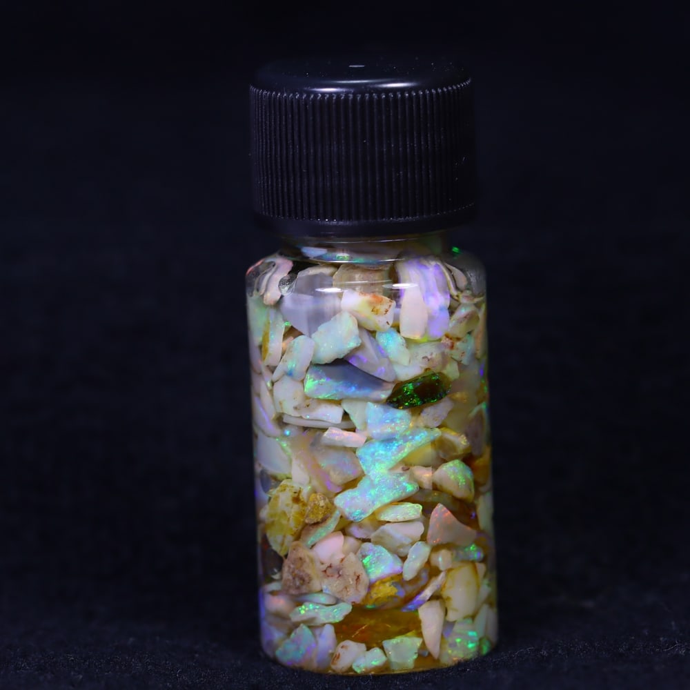 Australian Lightning Ridge Crystal Black Opal Rough Chip Jar (Good For Display): Ksmith Jewels Global Welcome to our auction house, today auction brought to you by Ksmith Jewels Global based in Penang, Malaysia specialize in all kinds of opal and color gemstone both in manufacturi
