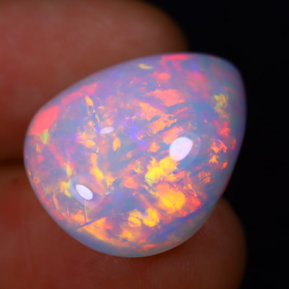 14.76Ct Welo Opal Polished - Ethiopian Opal - Pear Cabochon: Ksmith Jewels Global Welcome to our auction house, today auction brought to you by Ksmith Jewels Global based in Penang, Malaysia specialize in all kinds of opal and color gemstone both in manufacturi