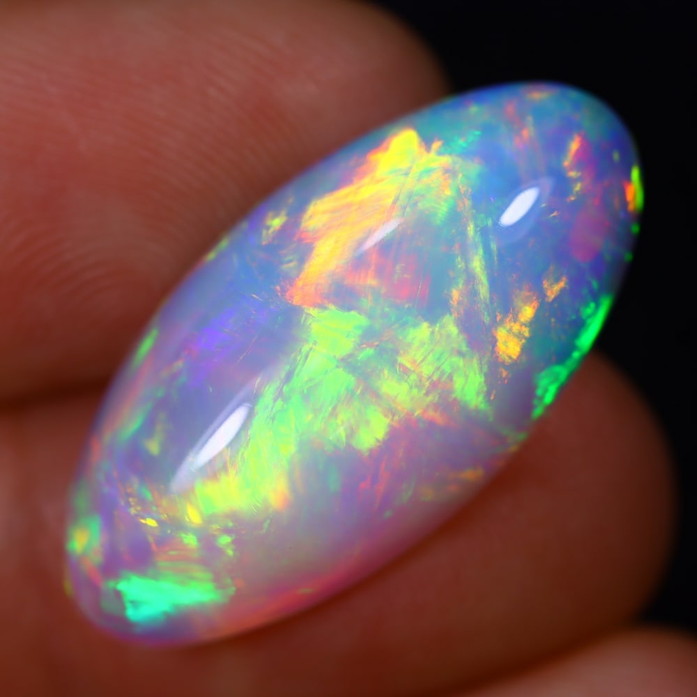 10.95Ct Welo Opal Polished - Ethiopian Opal - Oval Cabochon: Ksmith Jewels Global Welcome to our auction house, today auction brought to you by Ksmith Jewels Global based in Penang, Malaysia specialize in all kinds of opal and color gemstone both in manufacturi