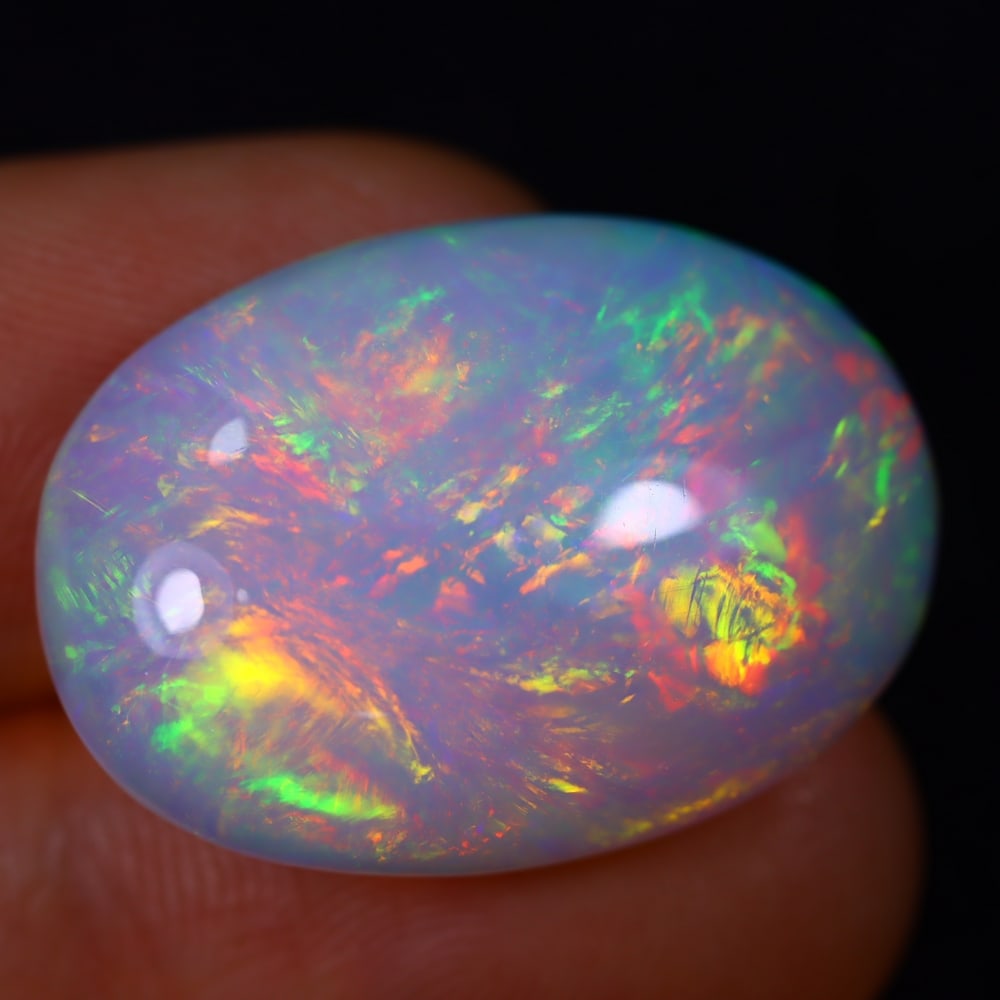 20.03Ct Welo Opal Polished - Ethiopian Opal - Oval Cabochon: Ksmith Jewels Global Welcome to our auction house, today auction brought to you by Ksmith Jewels Global based in Penang, Malaysia specialize in all kinds of opal and color gemstone both in manufacturi